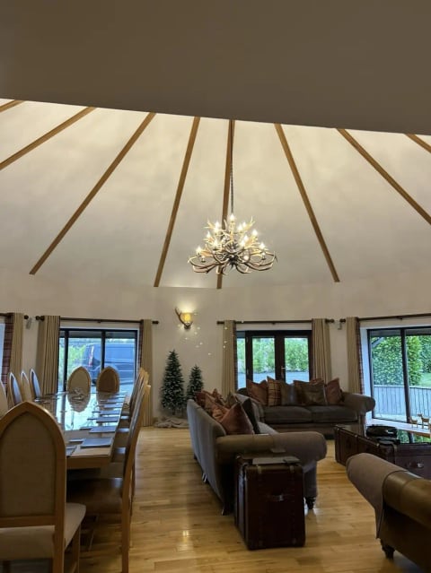The round-roofed living and dining room at Hawkswood